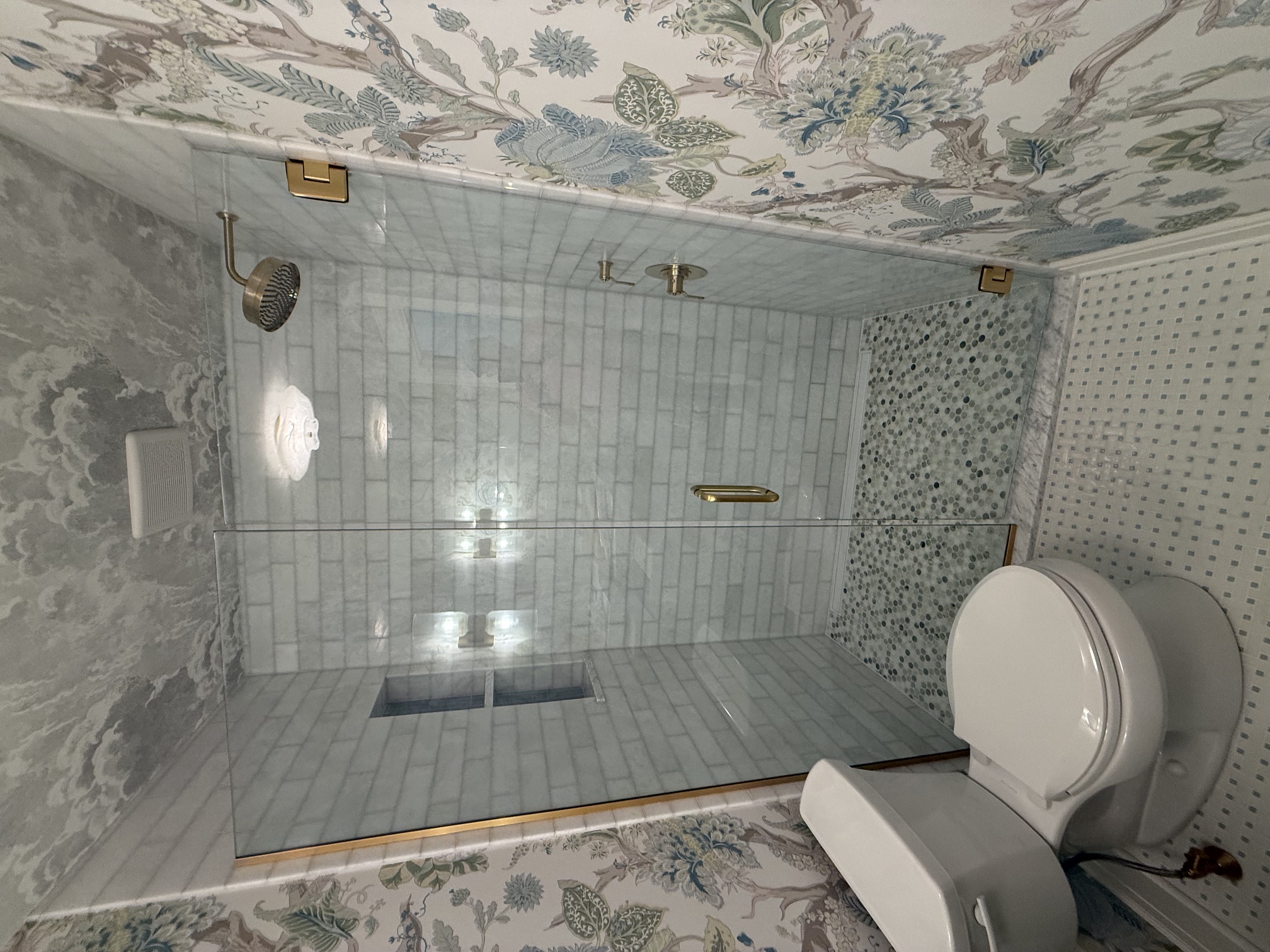 Finished bathroom with glass shower enclosure